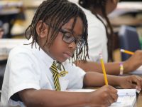 Student is learning all about reading and writing at Grant Park Christian Academy
